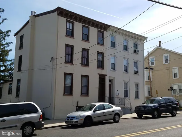 a car parked in front of a house
