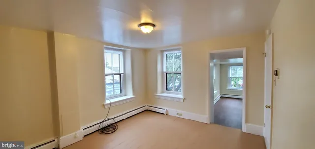 an empty room with windows