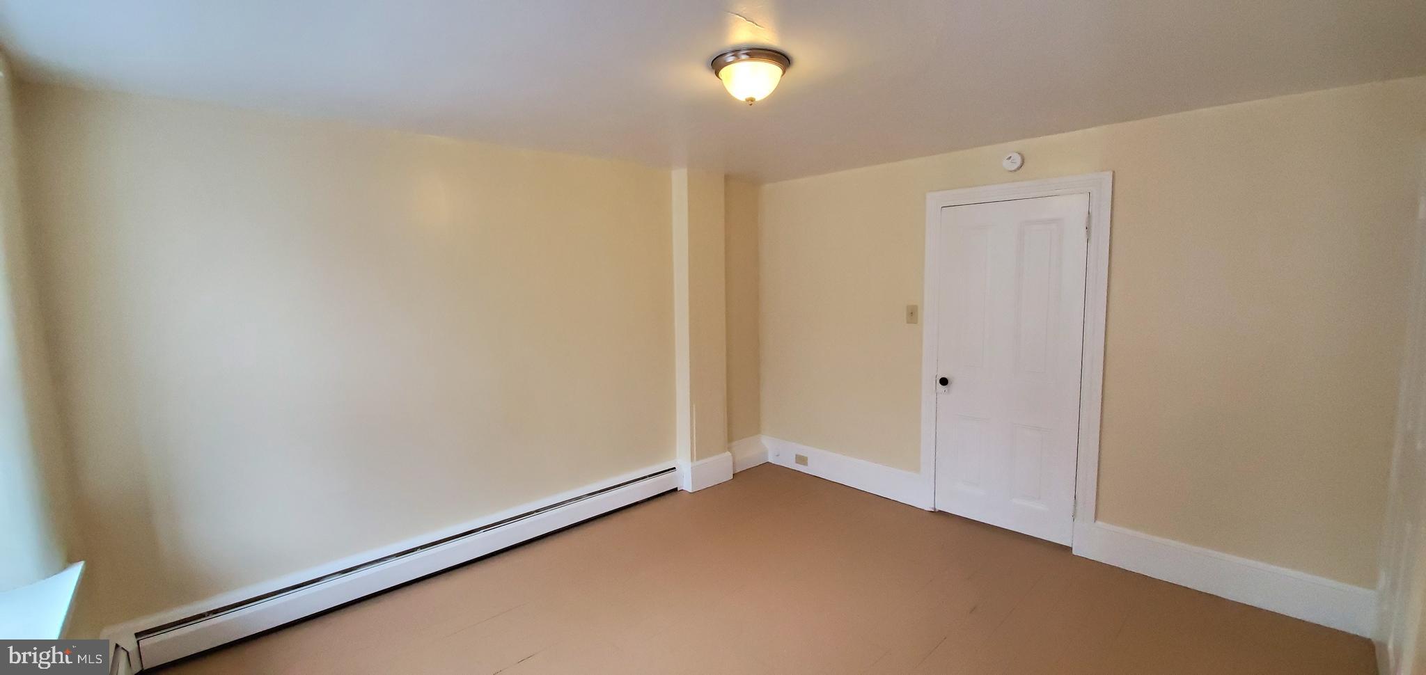 128 New Street Spring City, PA 19475 - Photo 9 of 12 a view of an empty room