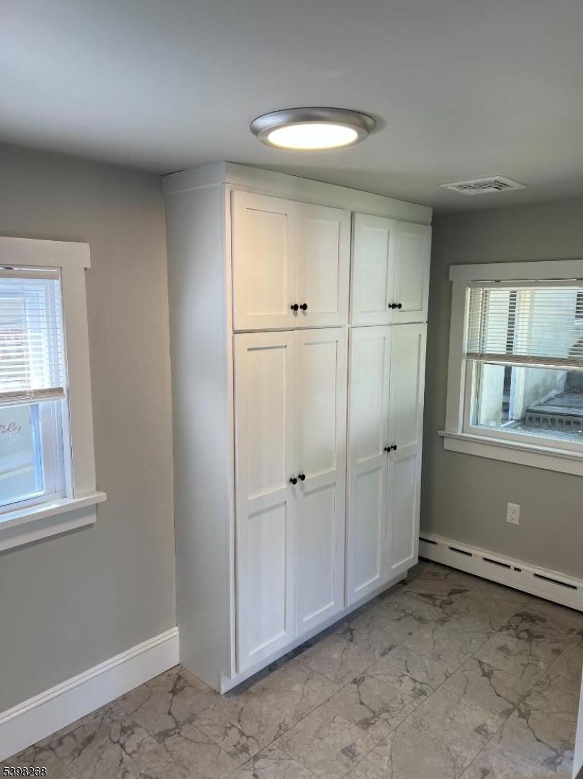 137 Mountain Avenue Gillette, NJ 07933 - Photo 12 of 17 a view of an empty room with a window