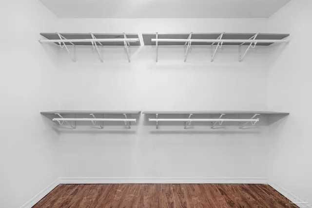 a view of an empty walk in closet