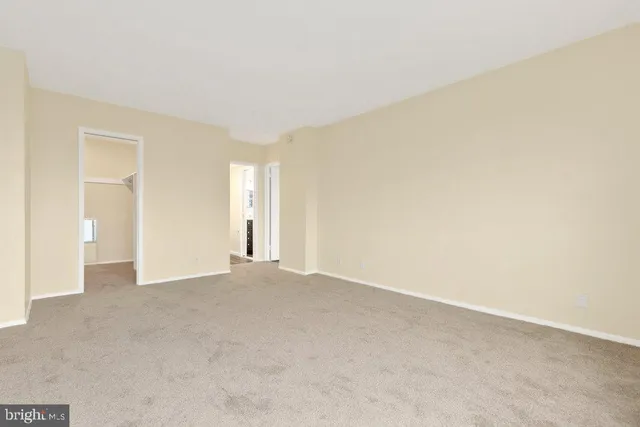 a view of an empty room and window