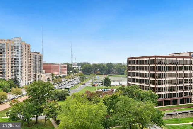 a view of a city with tall buildings