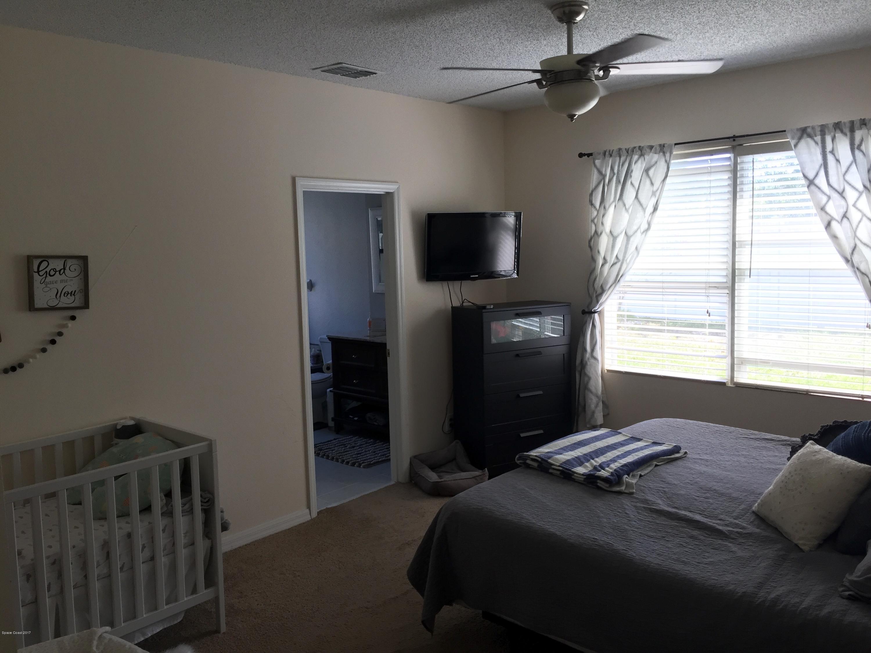 958 Riviera Point Drive Rockledge, FL 32955 - Photo 14 of 25 Master bedroom