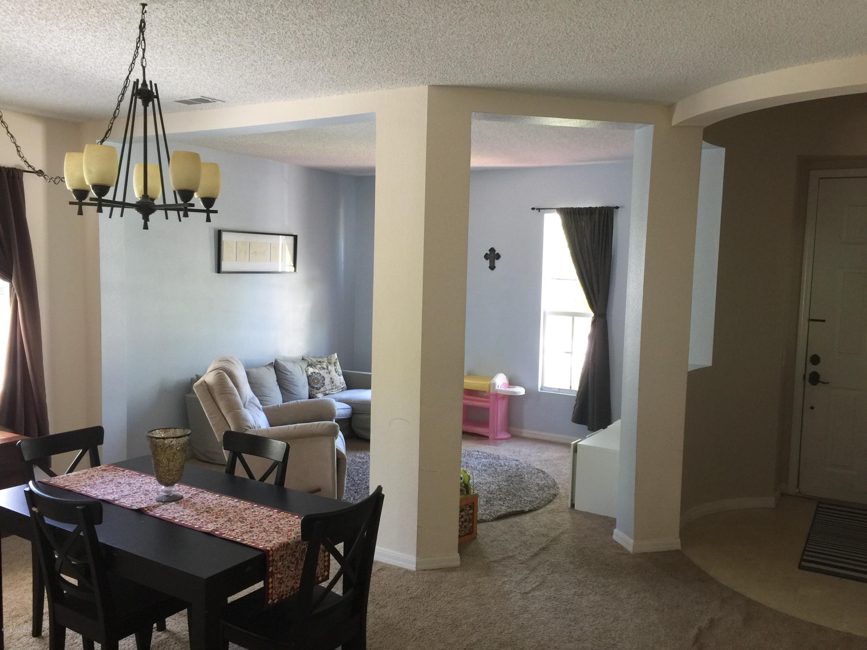 958 Riviera Point Drive Rockledge, FL 32955 - Photo 3 of 25 Living/Dining room