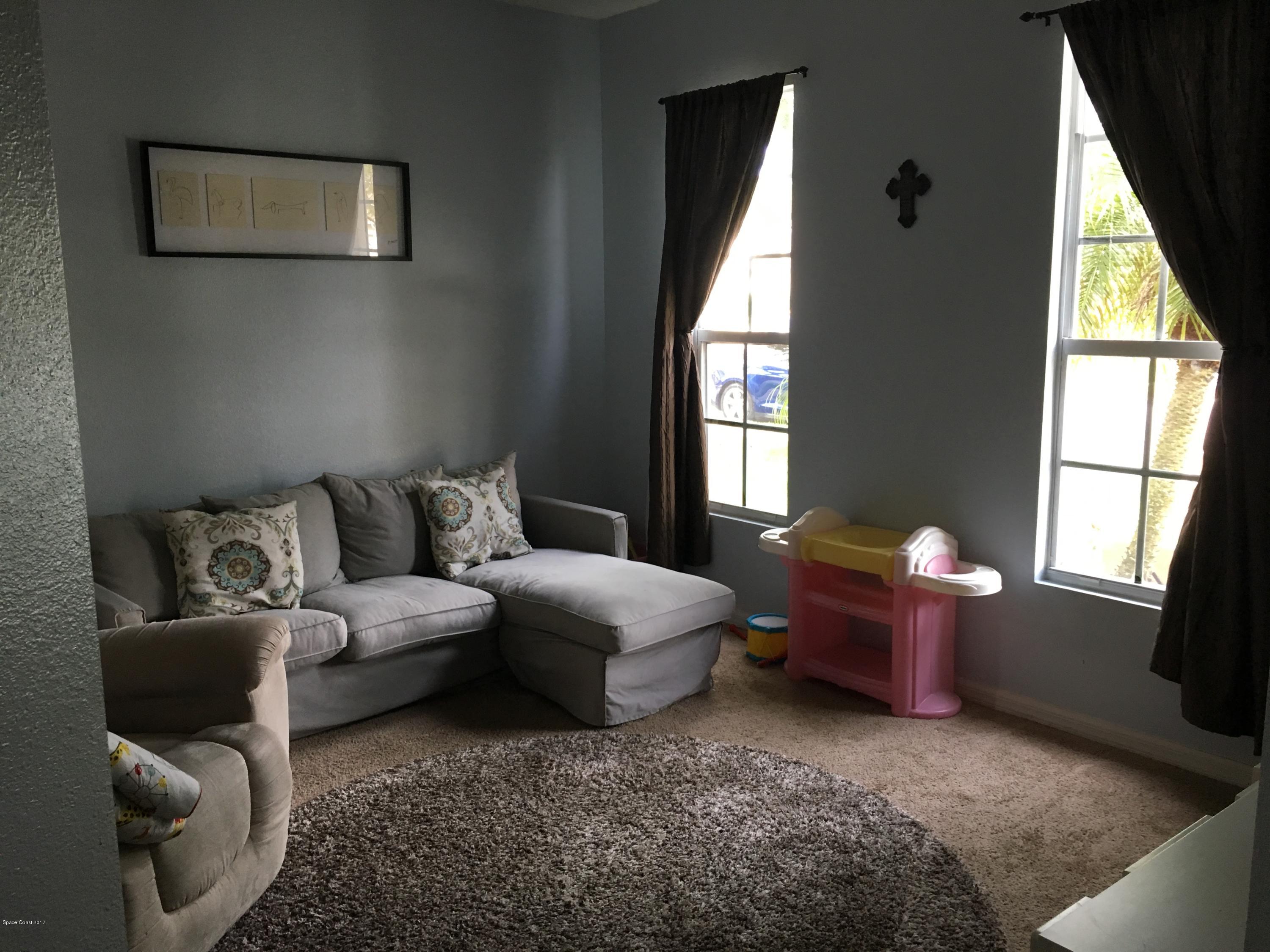 958 Riviera Point Drive Rockledge, FL 32955 - Photo 4 of 25 Living Room