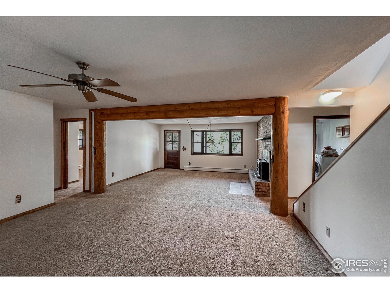 135 Lake Drive Lyons, CO 80540 - Photo 17 of 39 a view of a big room with closet and windows