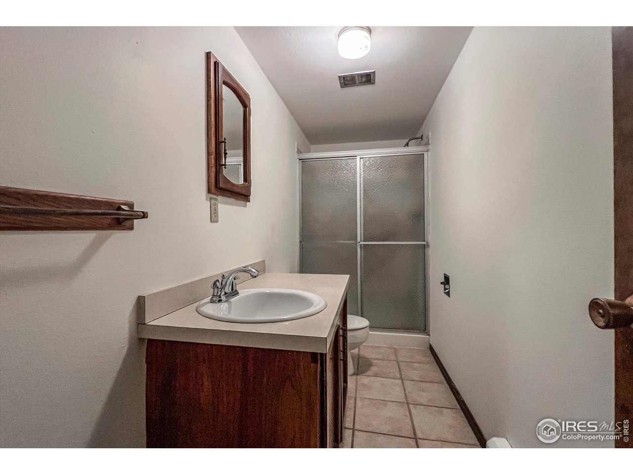 135 Lake Drive Lyons, CO 80540 - Photo 20 of 39 a bathroom with a sink and a mirror