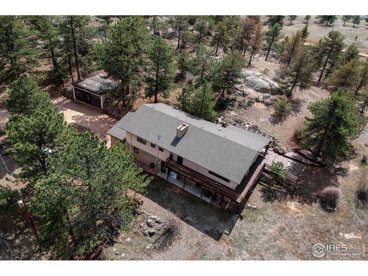 135 Lake Drive Lyons, CO 80540 - Photo 26 of 39 an aerial view of a house with a yard