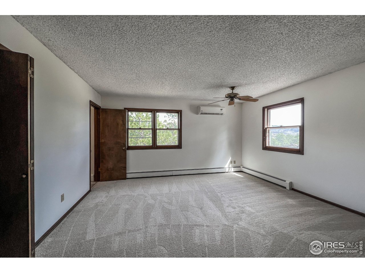 135 Lake Drive Lyons, CO 80540 - Photo 8 of 39 a view of an empty room with a window