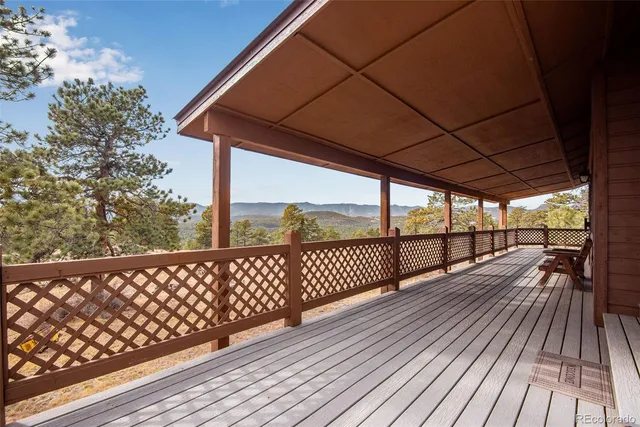 a view of balcony with wooden floor