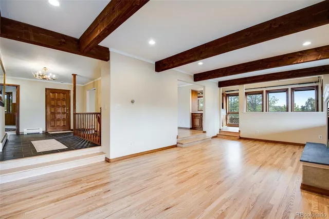 a view of a livingroom with wooden floor