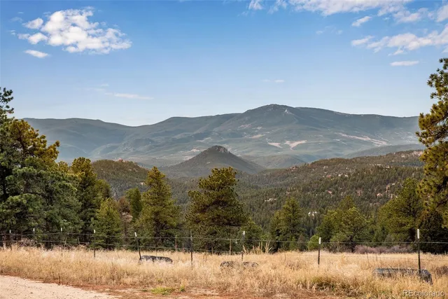 a view of a road with a mountain view