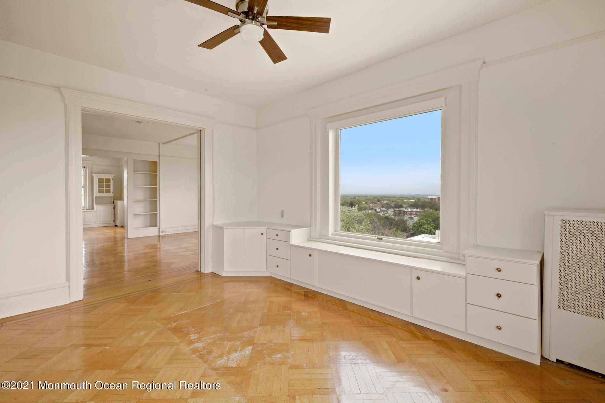 57 Union Street, Unit C4071 Montclair, NJ 07042 - Photo 16 of 27 a view of a livingroom with a ceiling fan and window