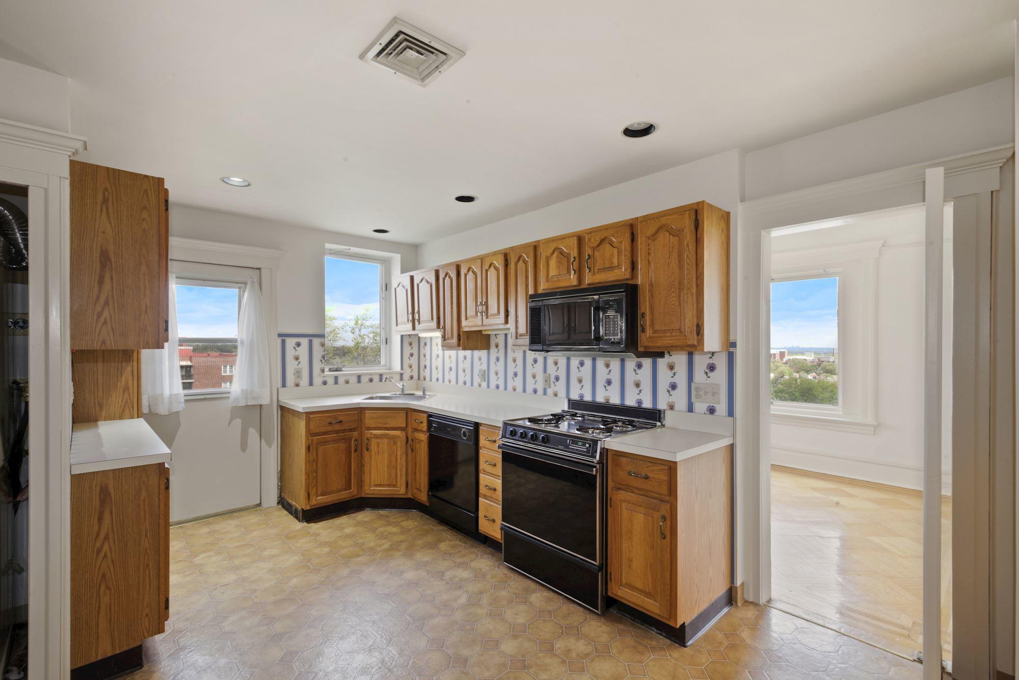 57 Union Street, Unit C4071 Montclair, NJ 07042 - Photo 19 of 27 a kitchen with stainless steel appliances granite countertop a stove and a sink