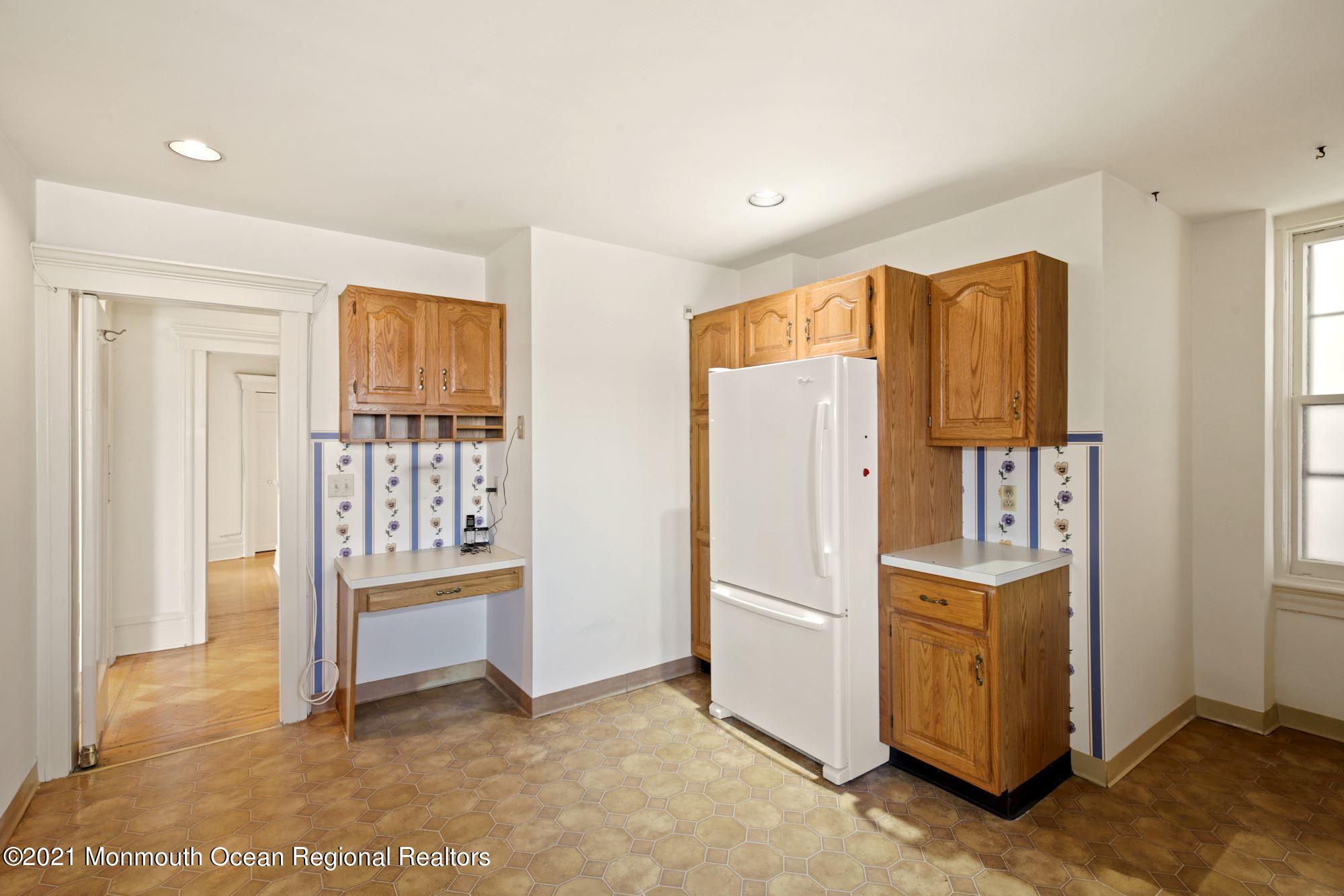 57 Union Street, Unit C4071 Montclair, NJ 07042 - Photo 20 of 27 a view of kitchen with stainless steel appliances wooden floor and chair