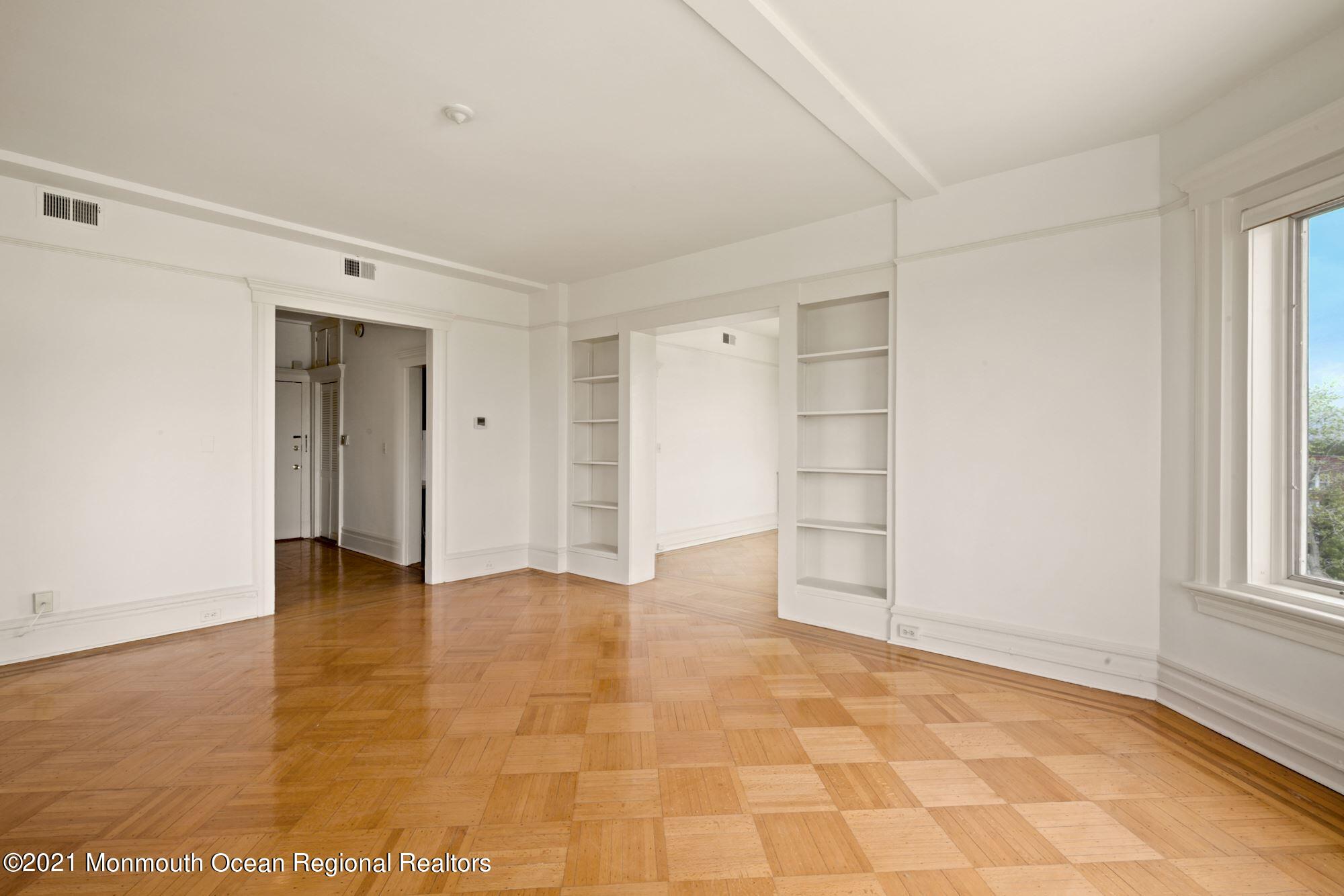 57 Union Street, Unit C4071 Montclair, NJ 07042 - Photo 7 of 27 a view of an empty room with cabinet and a window