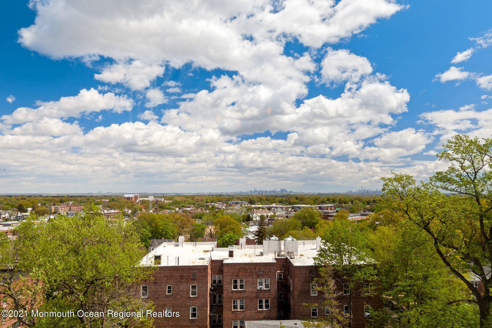 57 Union Street, Unit C4071 Montclair, NJ 07042 - Photo 10 of 27 a view of a city with lots of residential buildings ocean and mountain view in back