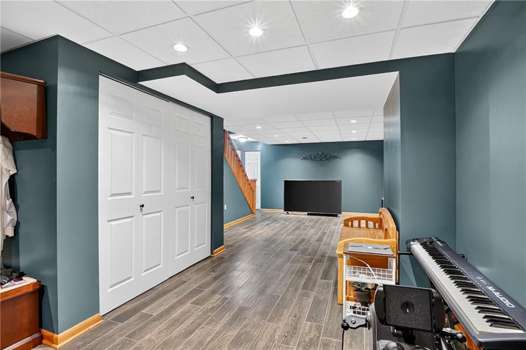 660 Allison Hollow Road Houston, PA 15342 - Photo 33 of 49 a bedroom with a bed and a workspace