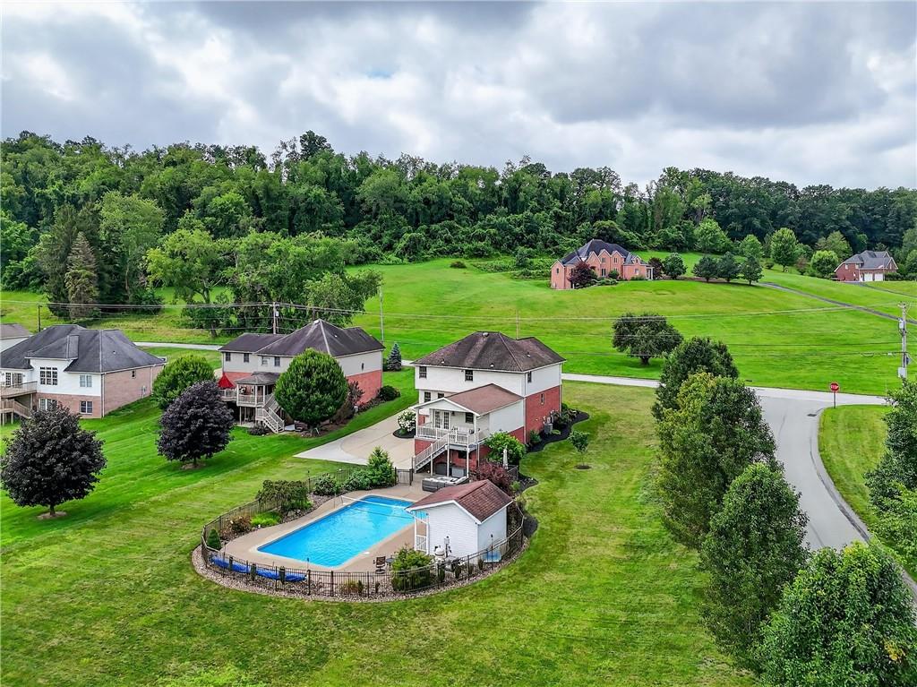 660 Allison Hollow Road Houston, PA 15342 - Photo 48 of 49 a view of a garden with swimming pool and outdoor seating