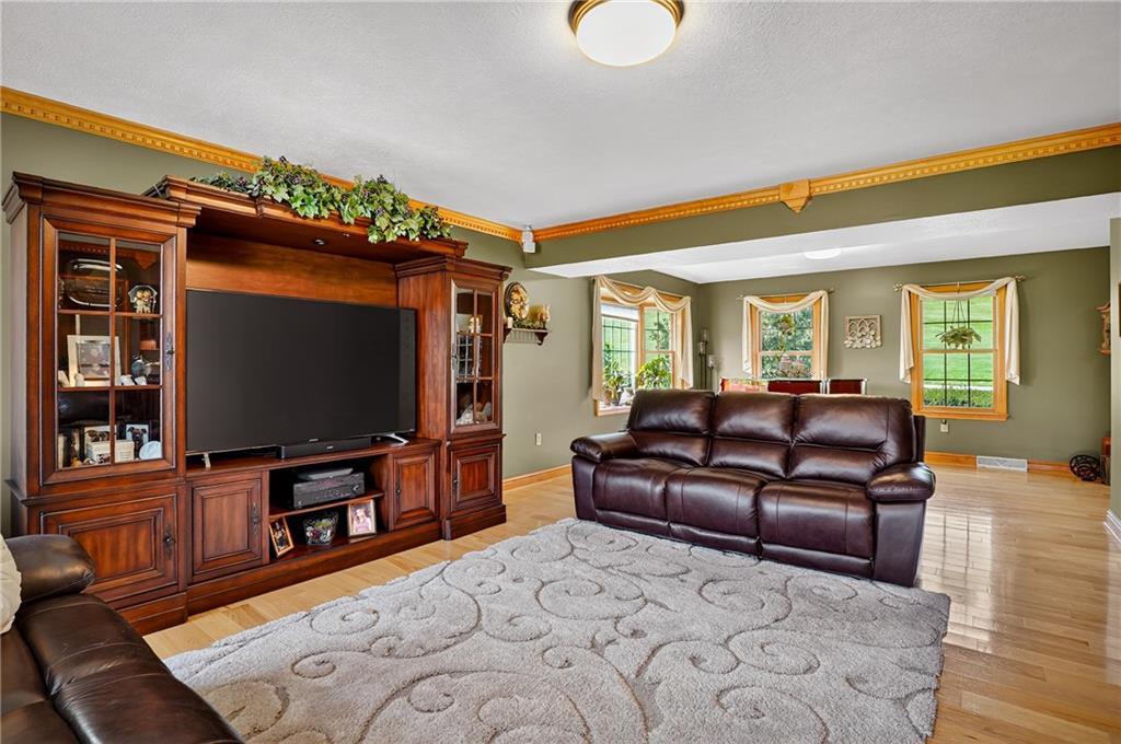 660 Allison Hollow Road Houston, PA 15342 - Photo 6 of 49 a living room with furniture and a flat screen tv