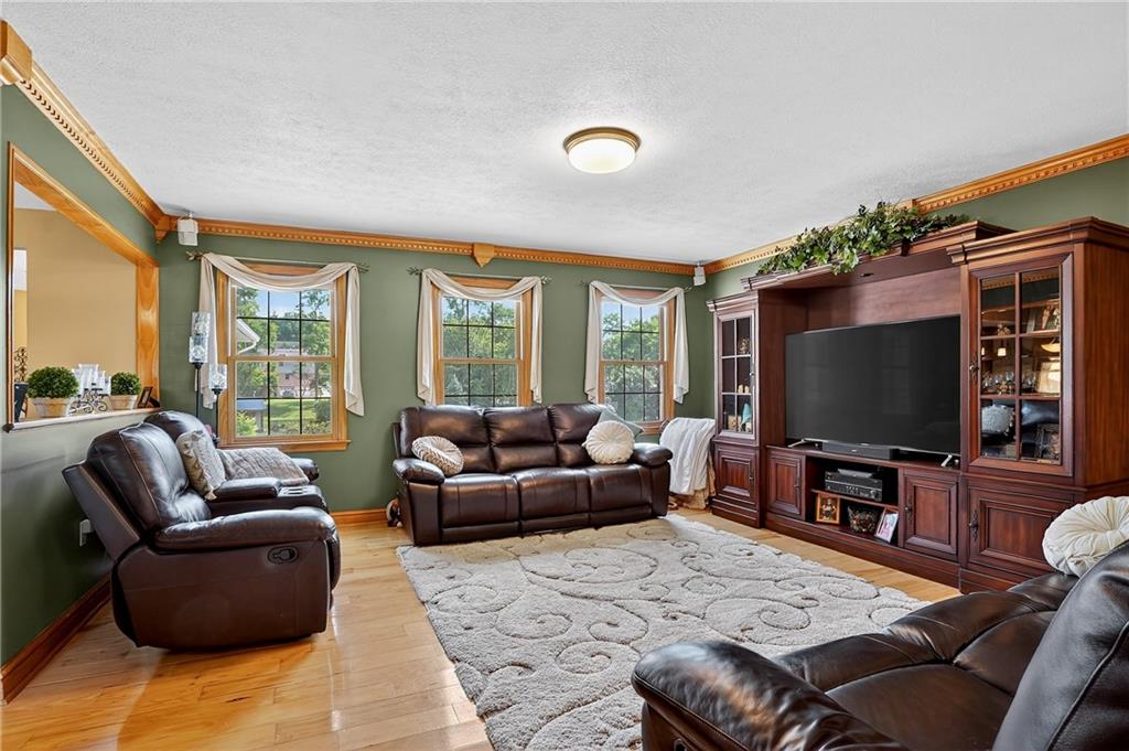 660 Allison Hollow Road Houston, PA 15342 - Photo 7 of 49 a living room with furniture and a flat screen tv