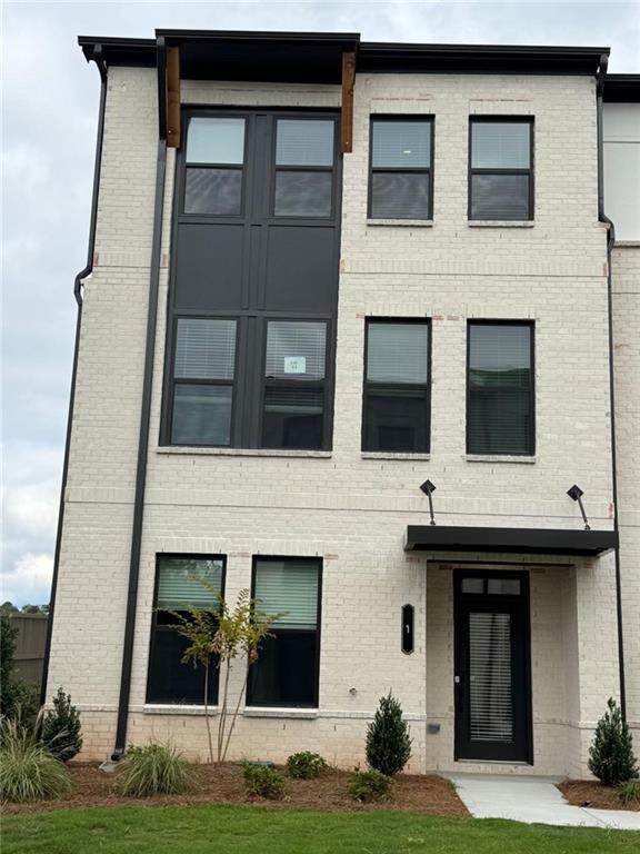 1 Peeples Drive Lawrenceville, GA 30046 - Photo 1 of 11 a house view with a garden space