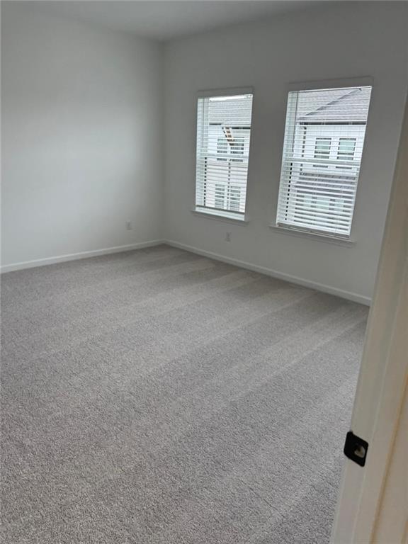 1 Peeples Drive Lawrenceville, GA 30046 - Photo 7 of 11 an empty room with windows