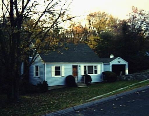 15 Williams Road Monroe, CT 06468 - Photo 1 of 1 a front view of a house with garden