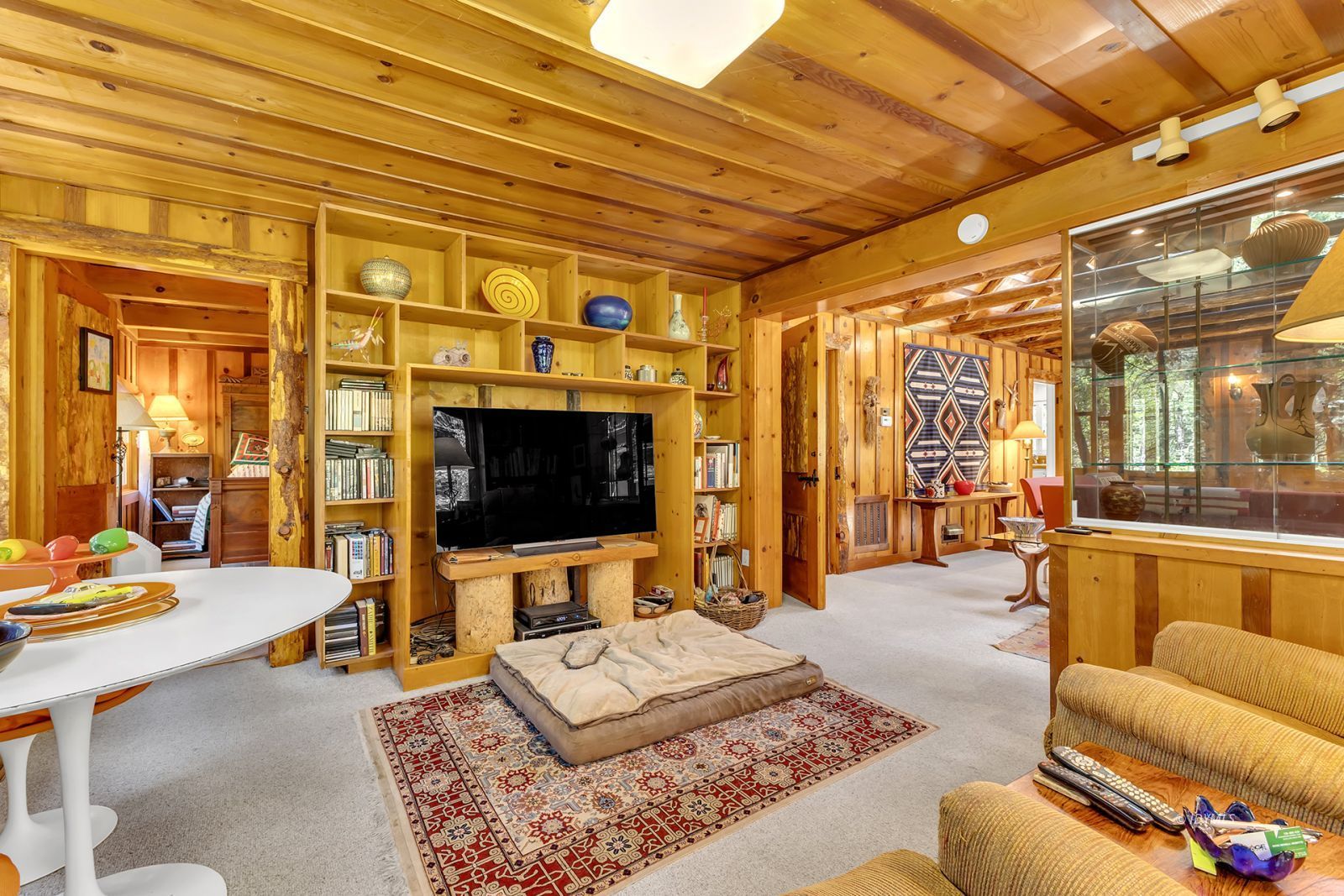 25100 Indian Rock Road Idyllwild, CA 92549 - Photo 19 of 75 a living room with furniture and a flat screen tv