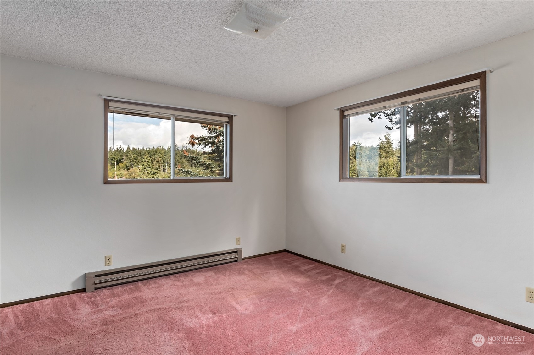 739 West Banta Road Oak Harbor, WA 98277 - Photo 16 of 40 an empty room with windows