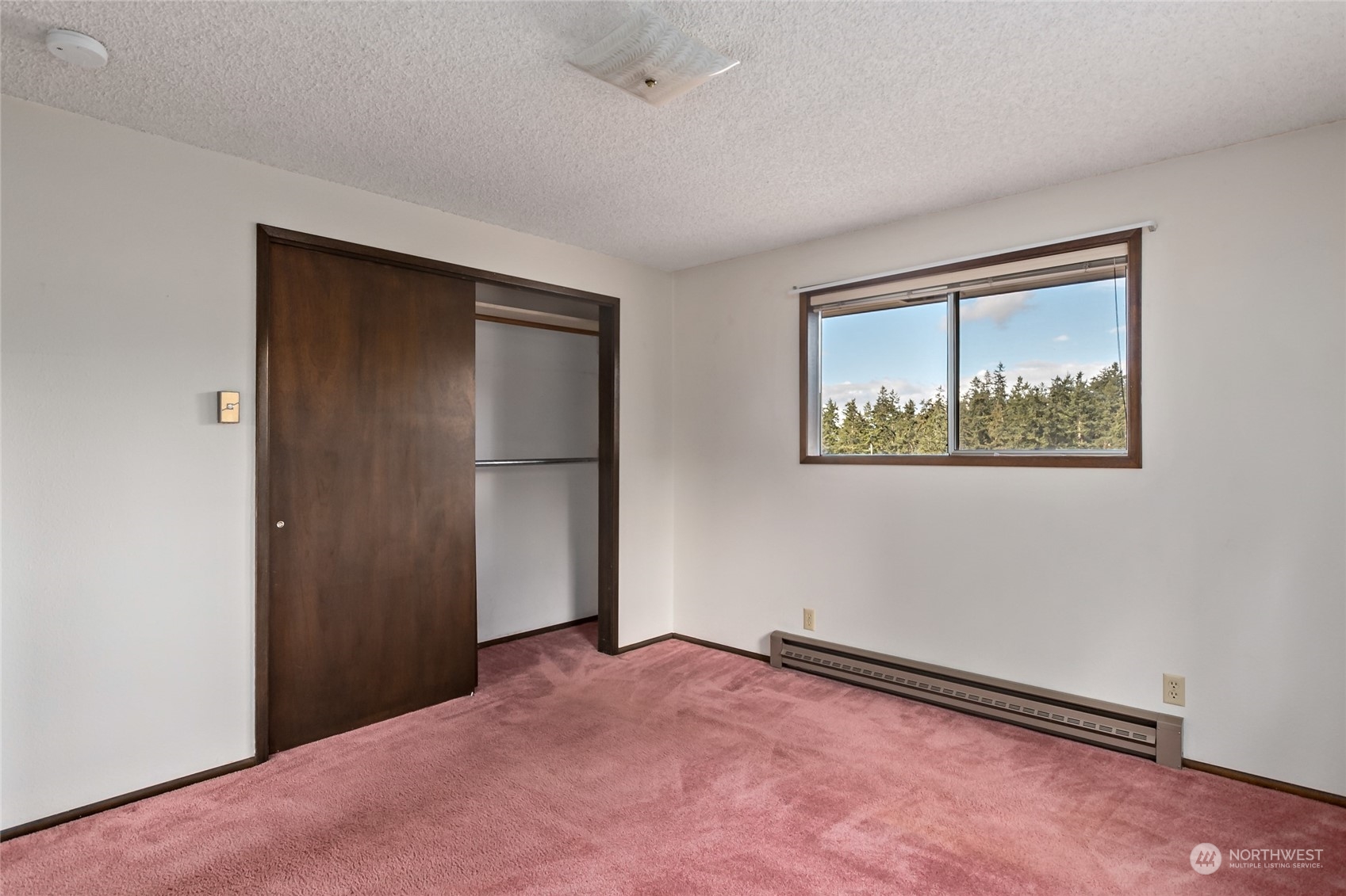 739 West Banta Road Oak Harbor, WA 98277 - Photo 17 of 40 an empty room with a door