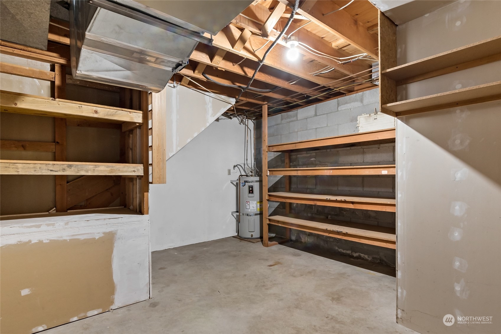 739 West Banta Road Oak Harbor, WA 98277 - Photo 30 of 40 a view of room with stairs and a microwave