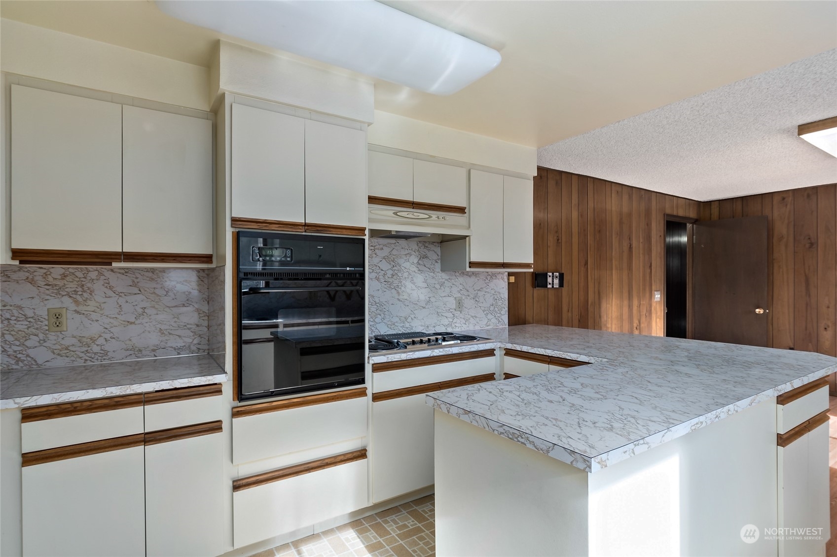 739 West Banta Road Oak Harbor, WA 98277 - Photo 3 of 40 a kitchen with kitchen island a counter top and space stainless steel appliances