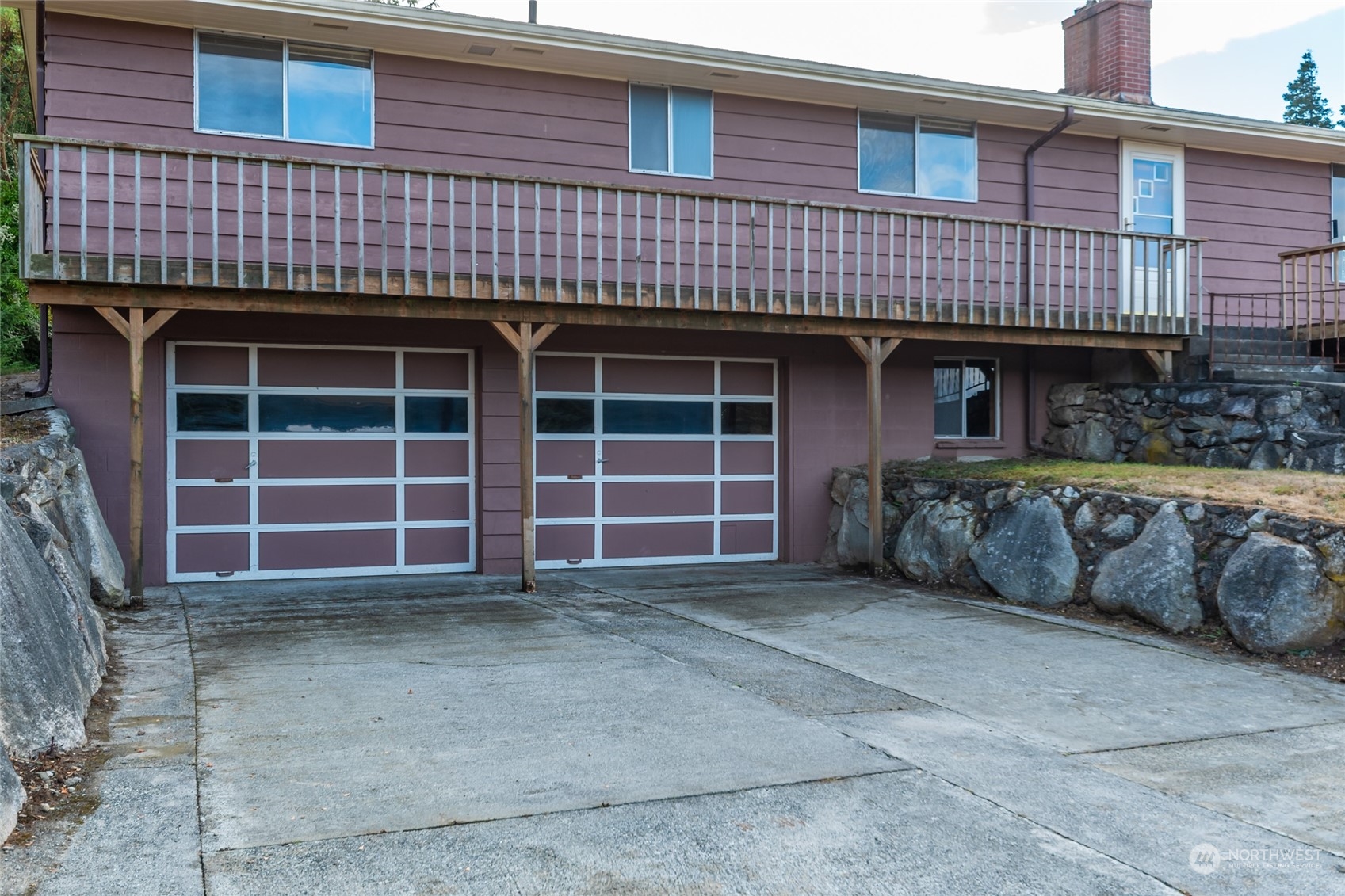 739 West Banta Road Oak Harbor, WA 98277 - Photo 32 of 40 a view of a house with a yard and garage