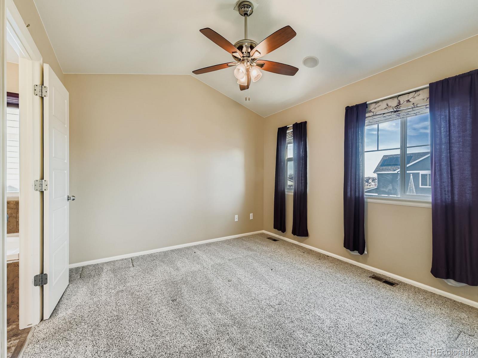 8645 Raspberry Drive Frederick, CO 80504 - Photo 23 of 29 a view of an empty room with a window