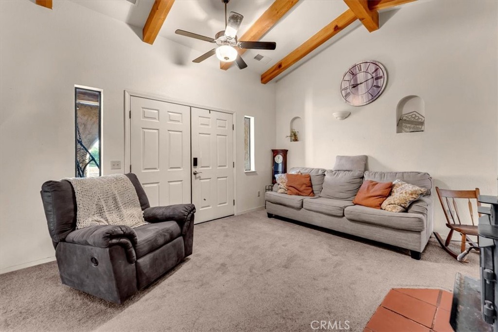 21550 Leaf Avenue Corning, CA 96021 - Photo 2 of 71 a living room with furniture and a window
