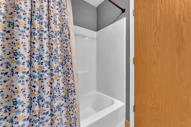 a view of a storage & utility room with washer and dryer