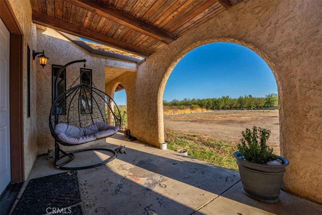 21550 Leaf Avenue Corning, CA 96021 - Photo 38 of 71 a view of a terrace with furniture and garden
