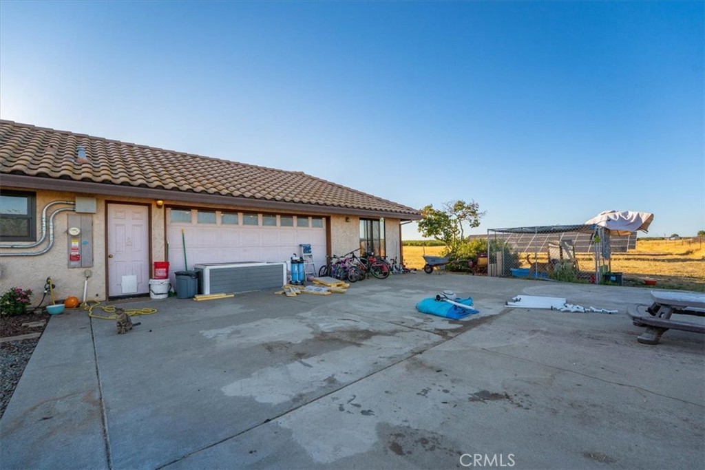 21550 Leaf Avenue Corning, CA 96021 - Photo 60 of 71 a view of a house with patio