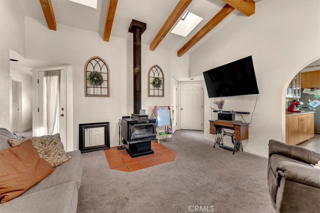 21550 Leaf Avenue Corning, CA 96021 - Photo 6 of 71 a living room with furniture and a flat screen tv