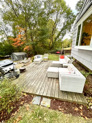 a backyard of a house with trees and outdoor space