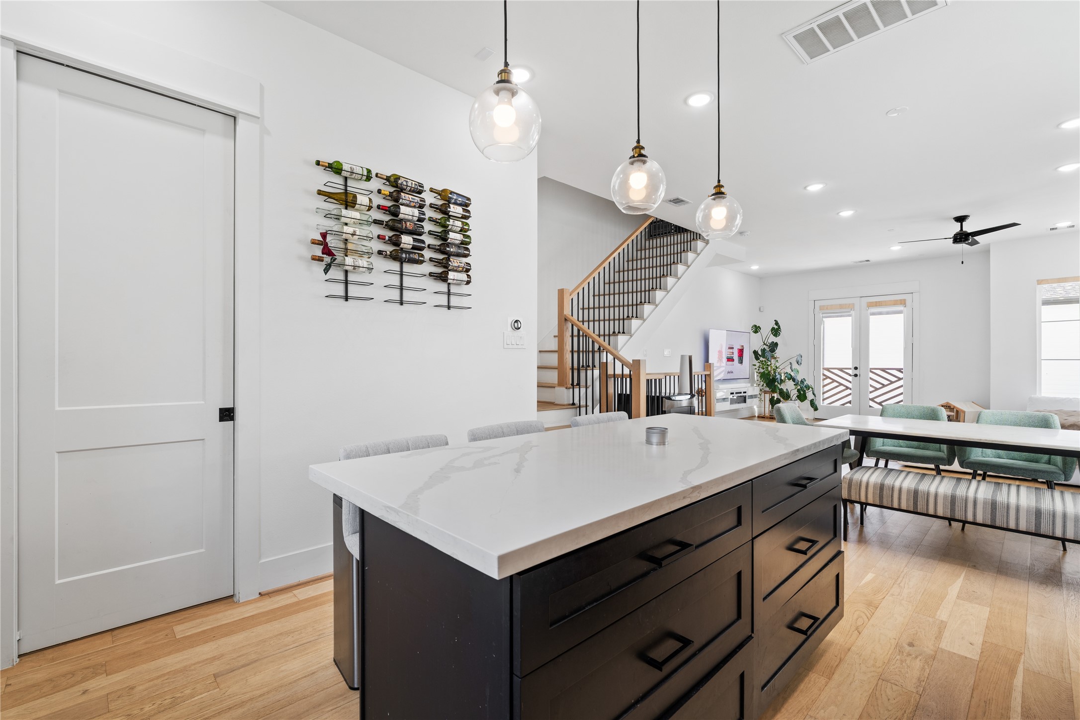 1835 Flowing Springs Trail Houston, TX 77080 - Photo 15 of 25 an open kitchen with a sink and dishwasher with wooden floor