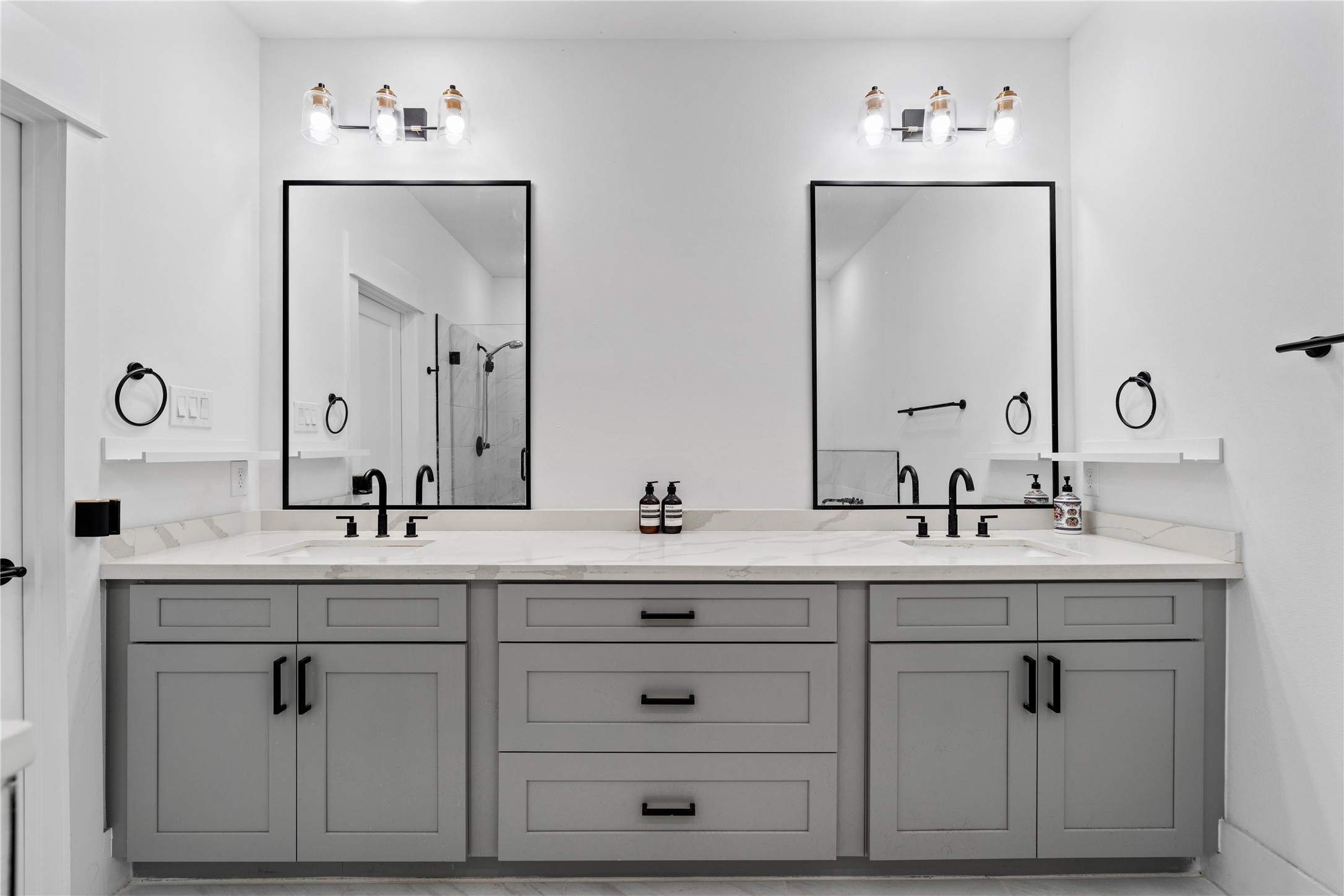 1835 Flowing Springs Trail Houston, TX 77080 - Photo 20 of 25 a bathroom with a double vanity sink mirror and