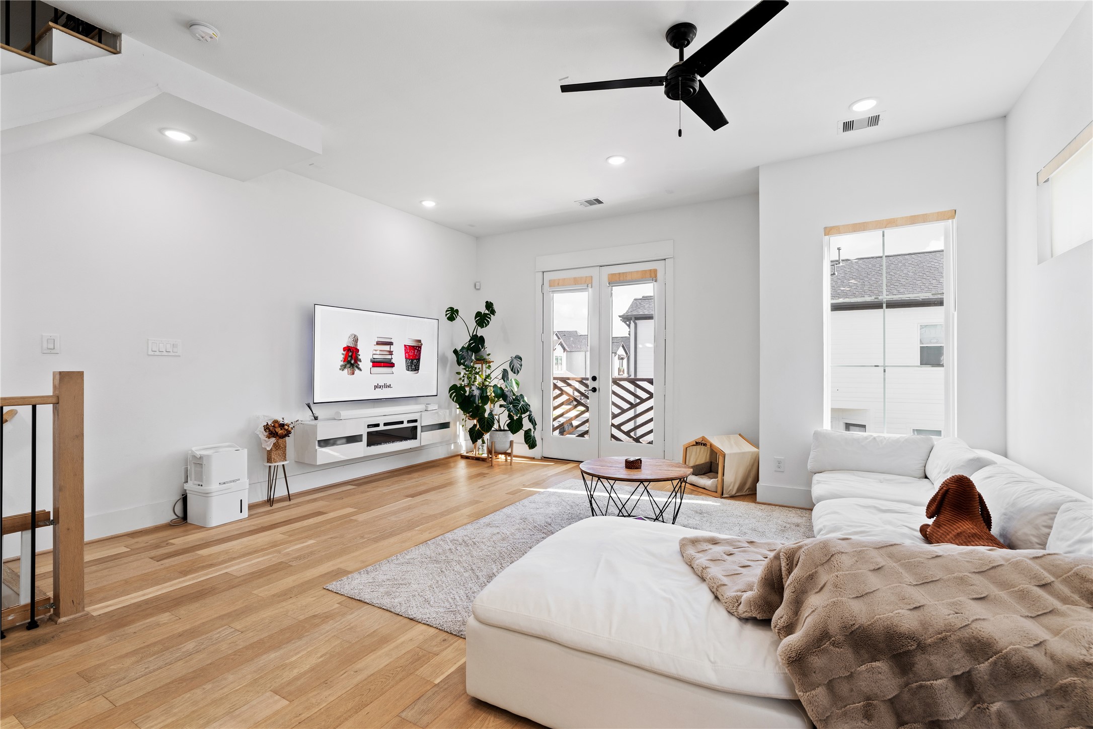 1835 Flowing Springs Trail Houston, TX 77080 - Photo 6 of 25 a living room with furniture and a flat screen tv