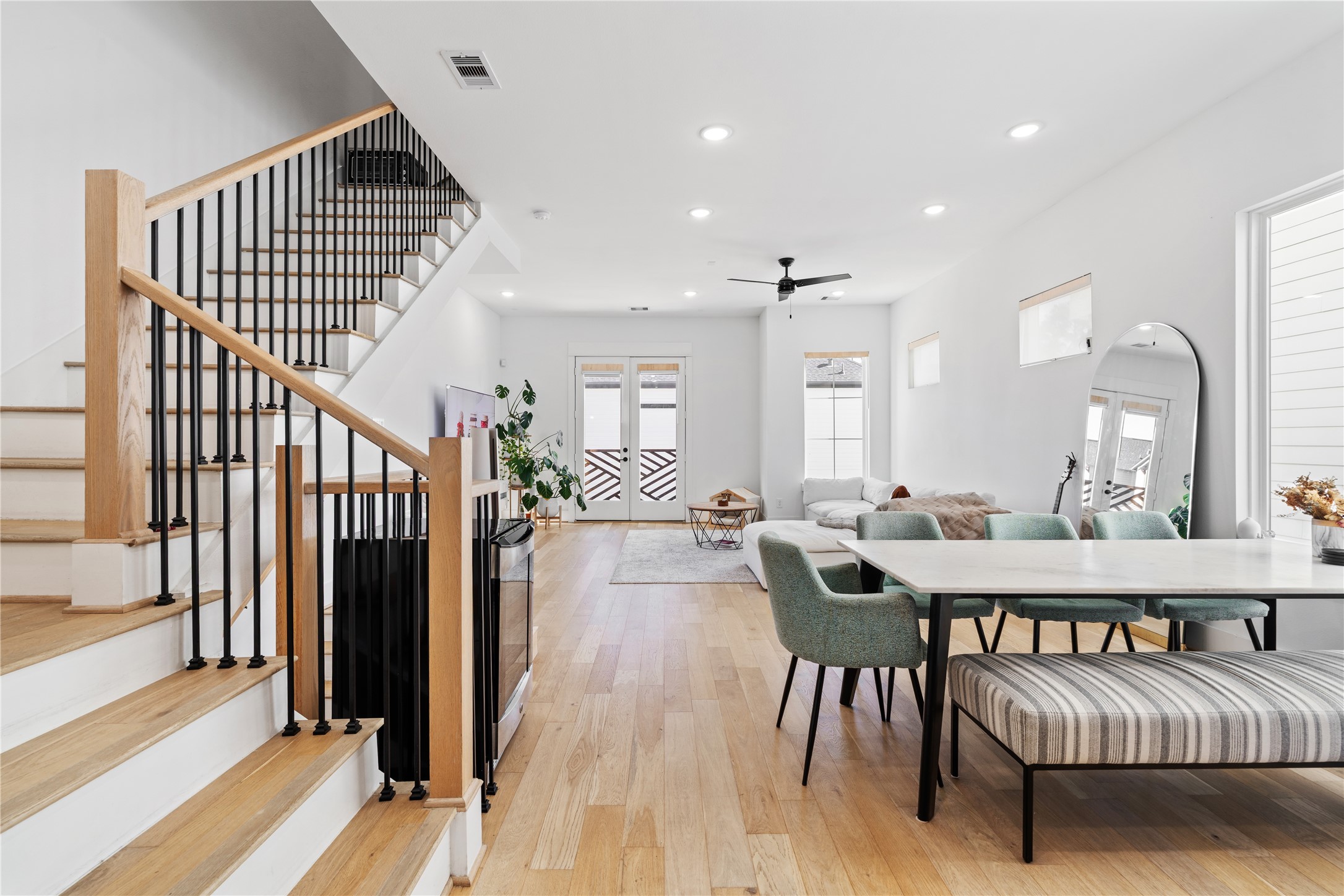 1835 Flowing Springs Trail Houston, TX 77080 - Photo 10 of 25 a view of a a dining room with furniture window and wooden floor