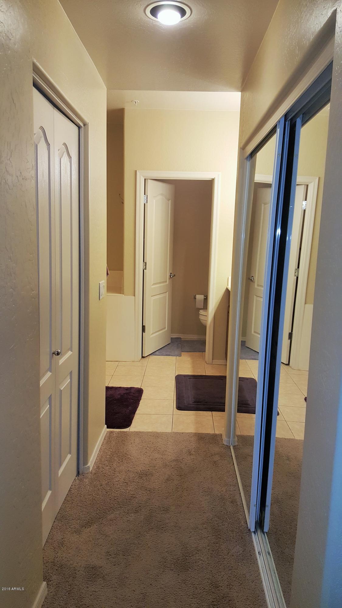 705 West Queen Creek Road, Unit 2210 Chandler, AZ 85248 - Photo 19 of 38 Master Suite Hallway