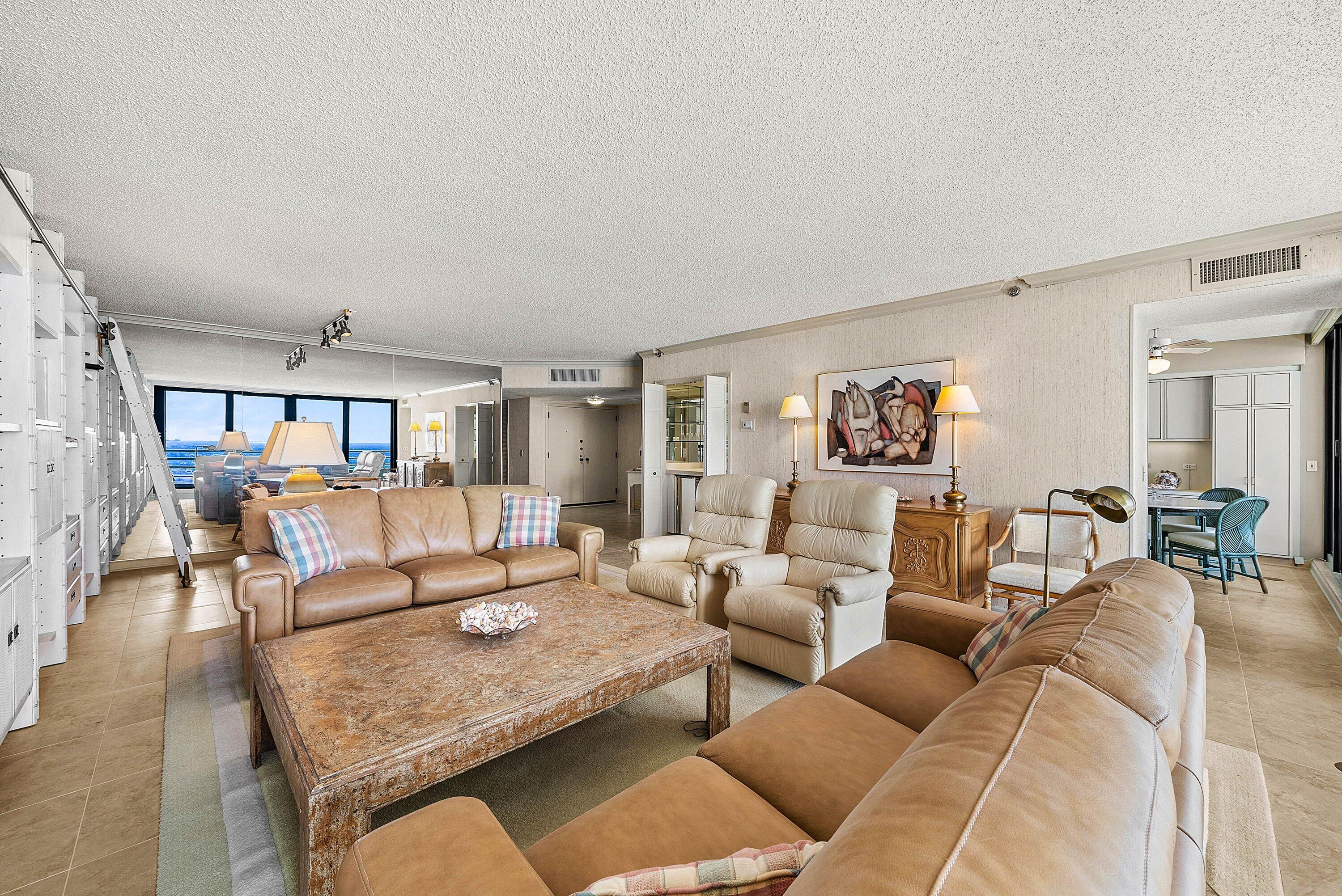 1500 South Ocean Boulevard, Unit 604 Boca Raton, FL 33432 - Photo 12 of 61 a living room with furniture and wooden floor