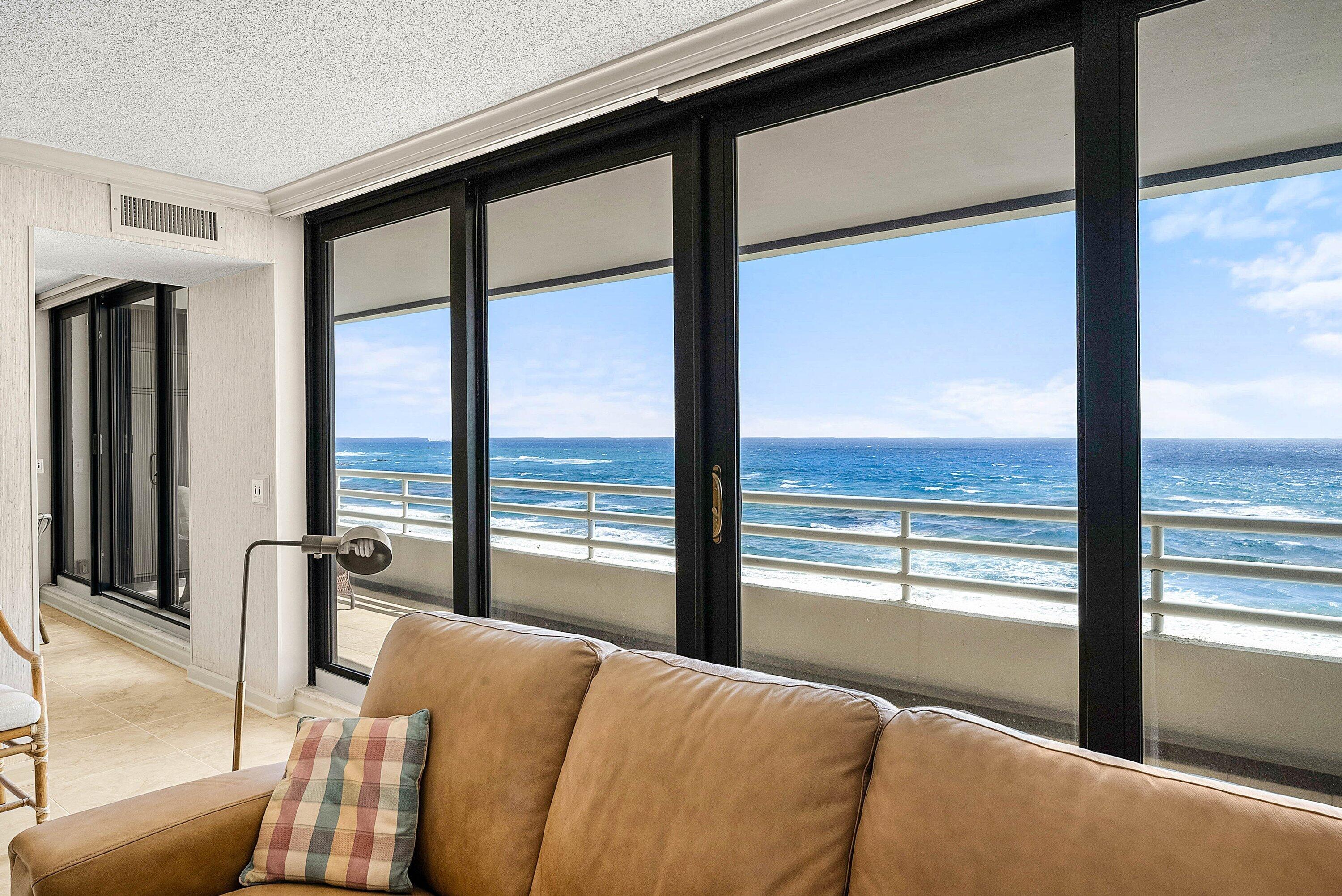 1500 South Ocean Boulevard, Unit 604 Boca Raton, FL 33432 - Photo 15 of 61 a bedroom with furniture and a floor to ceiling window