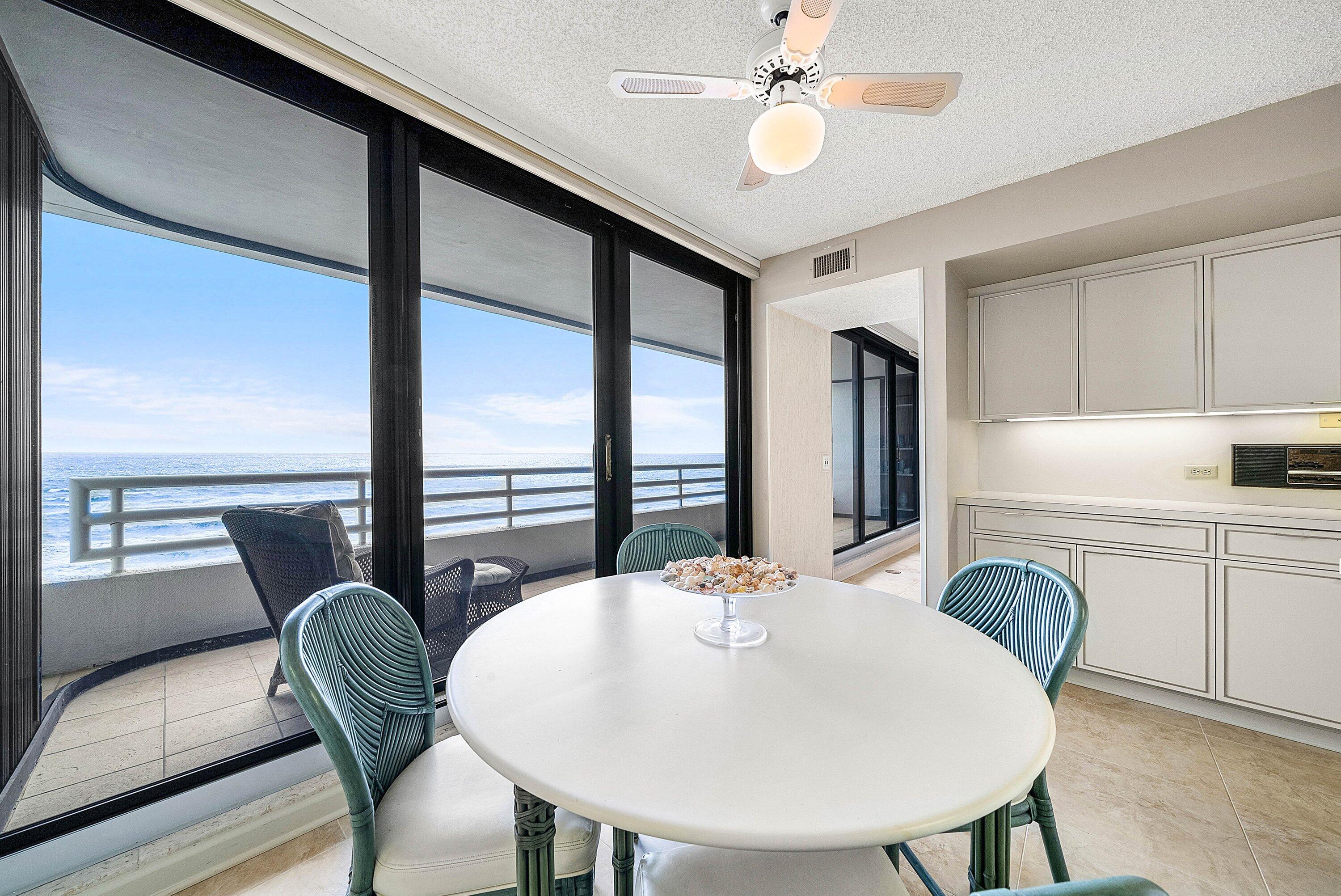 1500 South Ocean Boulevard, Unit 604 Boca Raton, FL 33432 - Photo 17 of 61 a view of a dining room with furniture window and outside view